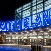 Staten Island Ferry sign, symbolizing the community Troops Relief Fund serves through car donations