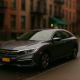 Gray Honda Civic parked on a NYC street, illustrating Staten Island car donation with Troops Relief Fund.
