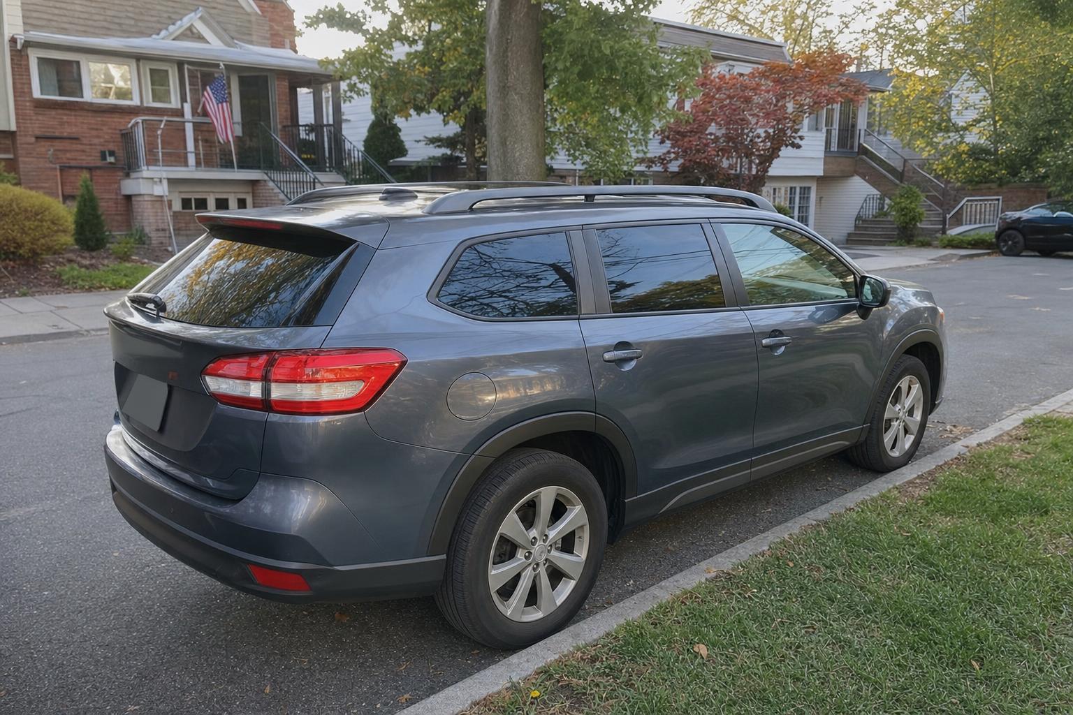 A car parked on a residential street in Staten Island